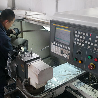 CNC machining center producing filling valve parts
